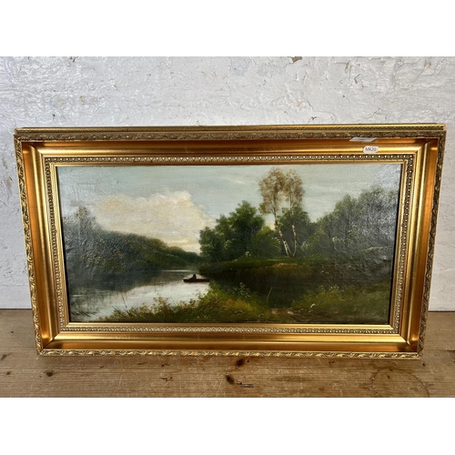 186 - An early 20th century gilt framed oil on canvas of a fishing scene signed lower left - approx. 42cm ... 