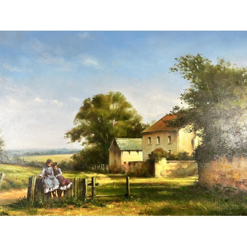 192 - A late 20th century gilt framed oil on canvas featuring two children in rural landscape - approx. 59... 