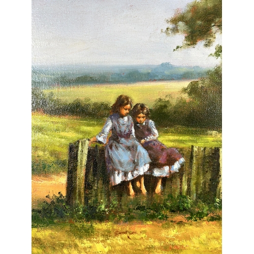 192 - A late 20th century gilt framed oil on canvas featuring two children in rural landscape - approx. 59... 