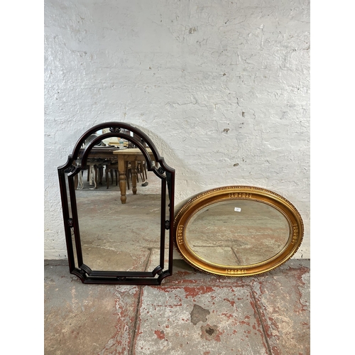 194 - Two wall mirrors, one mahogany framed - approx. 108cm high x 67cm wide and one Regency style gilt fr... 