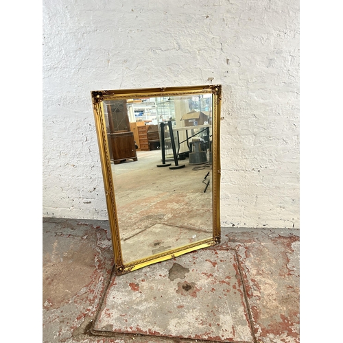 195 - A 19th century style gilt framed wall mirror - approx. 69cm high x 101cm wide