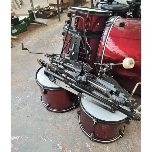 557 - A Rocket Music five piece drum kit with hardware