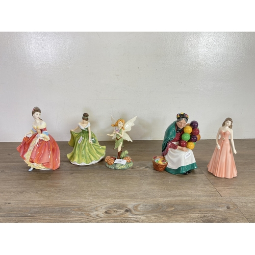 258 - Five Royal Doulton ceramic figurines to include Disney Fairies Beck, Flower of the Month December - ... 