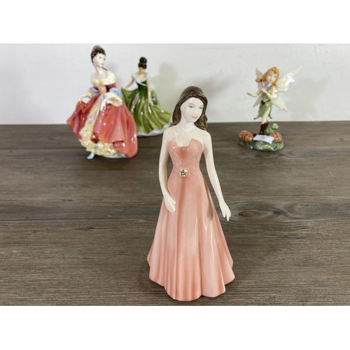 258 - Five Royal Doulton ceramic figurines to include Disney Fairies Beck, Flower of the Month December - ... 