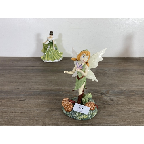 258 - Five Royal Doulton ceramic figurines to include Disney Fairies Beck, Flower of the Month December - ... 