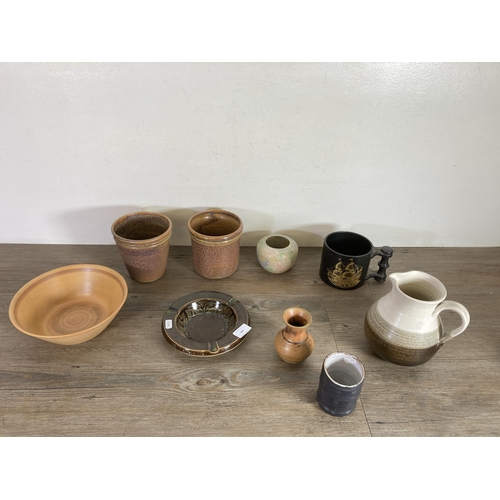 264 - Nine pieces of studio pottery to include Poole Aegean ashtray, 1970s Gretl Shapiro 18cm handled jug ... 