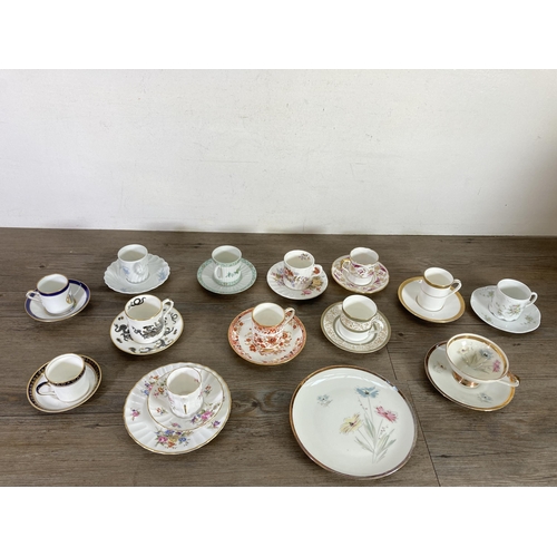 274 - A collection of ceramic cups and saucers to include Feltmann Weider hand painted trio, Royal Crown D... 