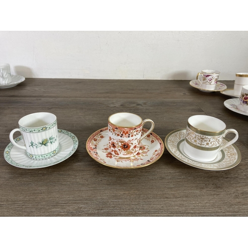 274 - A collection of ceramic cups and saucers to include Feltmann Weider hand painted trio, Royal Crown D... 