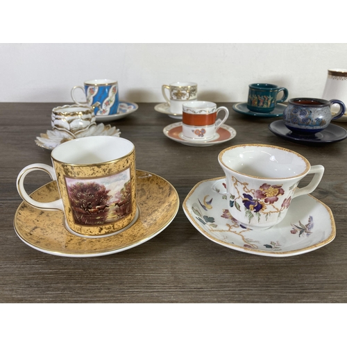 279 - Fourteen ceramic cups and saucers to include Wedgwood Devon Rose, Noritake, Coalport The gilded coff... 