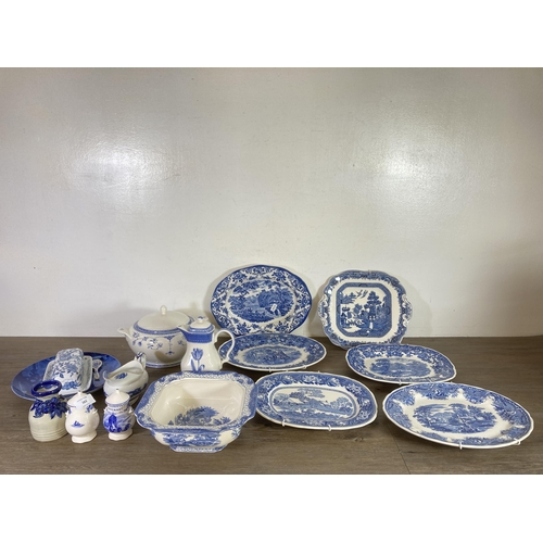 283 - Sixteen pieces of blue and white ceramics to include Royal Cauldon Dragon Series, gravy boat, Church... 