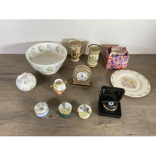 295 - Twelve items to include Royal Doulton Bunnykins dish, Wedgwood Clio quartz mantel clock, Aynsley urn... 