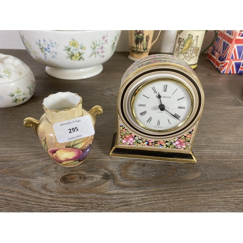 295 - Twelve items to include Royal Doulton Bunnykins dish, Wedgwood Clio quartz mantel clock, Aynsley urn... 