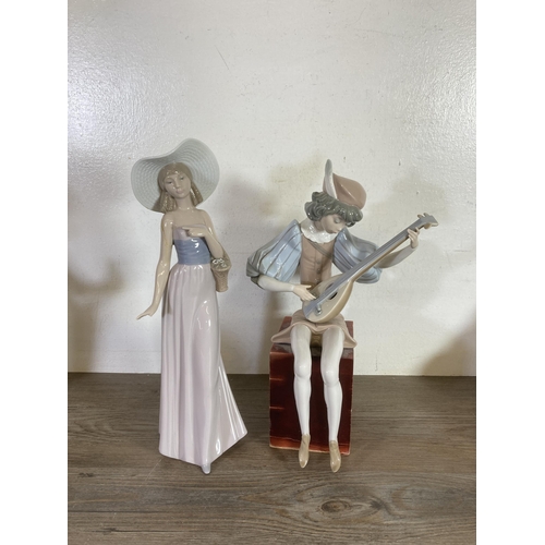 296 - Nine Spanish porcelain figurines to include Lladro, Nao etc.