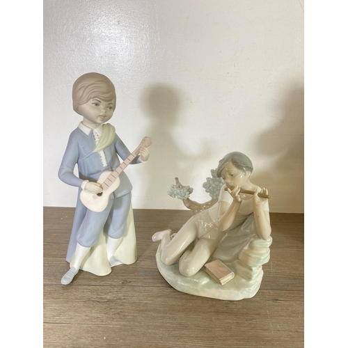 296 - Nine Spanish porcelain figurines to include Lladro, Nao etc.