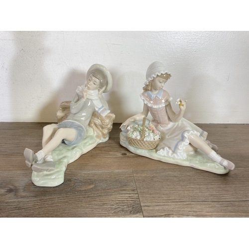 296 - Nine Spanish porcelain figurines to include Lladro, Nao etc.