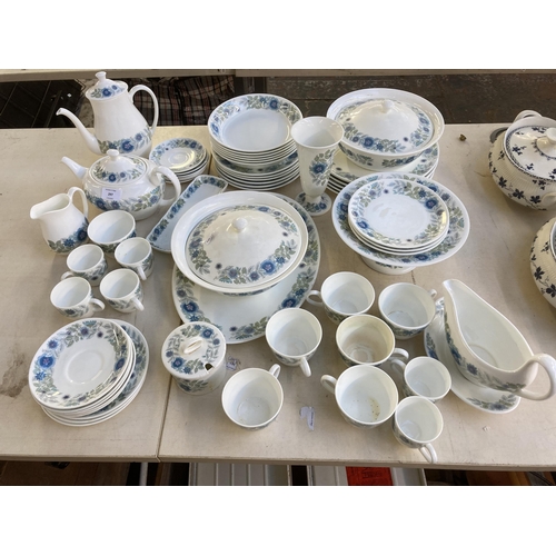 297 - A large collection of Wedgwood Clementine bone china dinnerware