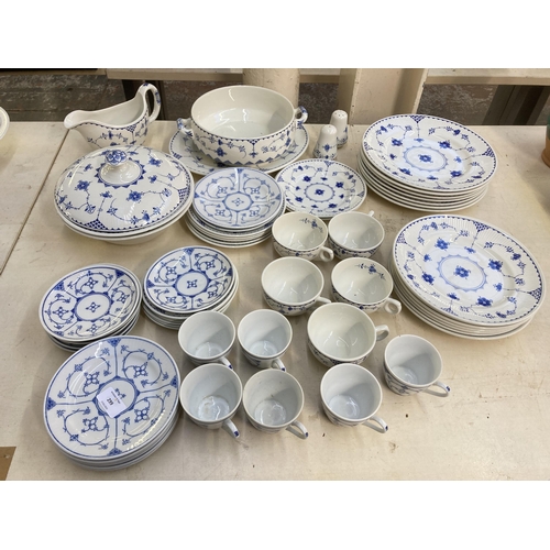 299 - A large collection of Denmark pattern fine bone china to include Mason's, Furnivals etc.