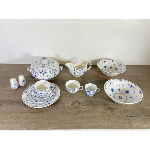 299 - A large collection of Denmark pattern fine bone china to include Mason's, Furnivals etc.