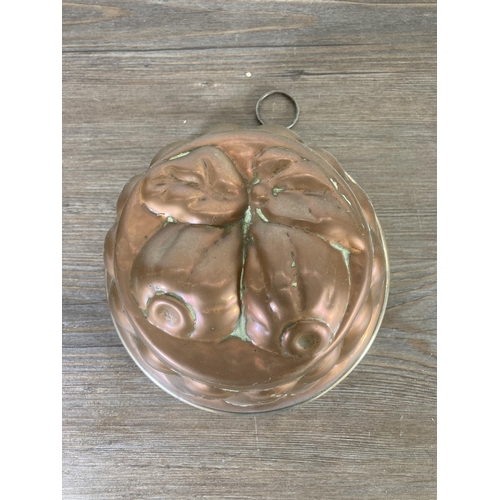 302 - Five vintage copper cake/jelly moulds