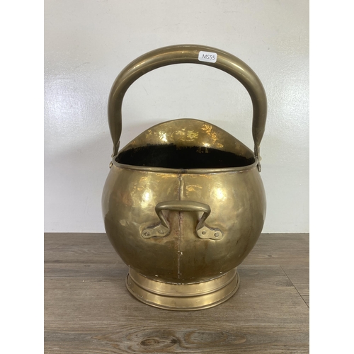 303 - A 19th century brass coal scuttle - approx. 34cm high