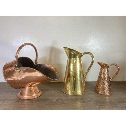 304 - Three pieces of late 19th/early 20th century metalware, one Joseph Sankey & Sons copper jug with all... 