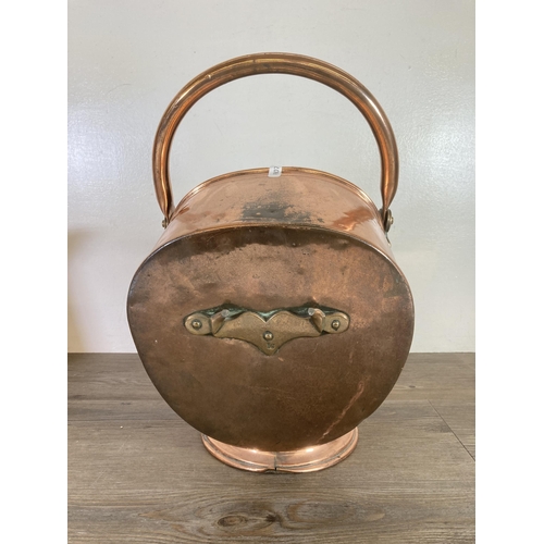 304 - Three pieces of late 19th/early 20th century metalware, one Joseph Sankey & Sons copper jug with all... 