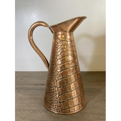 304 - Three pieces of late 19th/early 20th century metalware, one Joseph Sankey & Sons copper jug with all... 