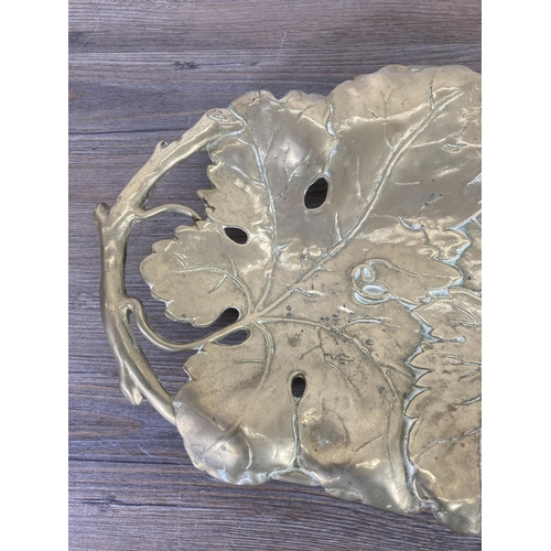 306 - An Art Nouveau style brass serving dish in the form of a grapevine - approx. 4.5cm high x 38cm wide ... 