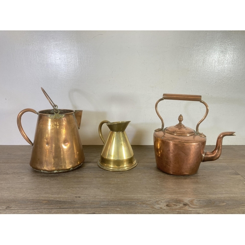 311 - Three pieces of 19th century copper and brassware, copper kettle with acorn finial, copper water jug... 