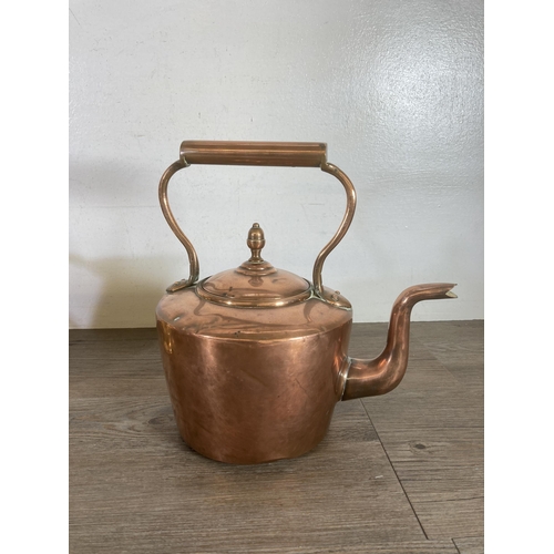 311 - Three pieces of 19th century copper and brassware, copper kettle with acorn finial, copper water jug... 