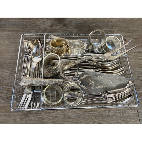 317 - A collection of metalware to include eight Mayell EP on Zinc napkin holders, Viners cutlery, cased s... 