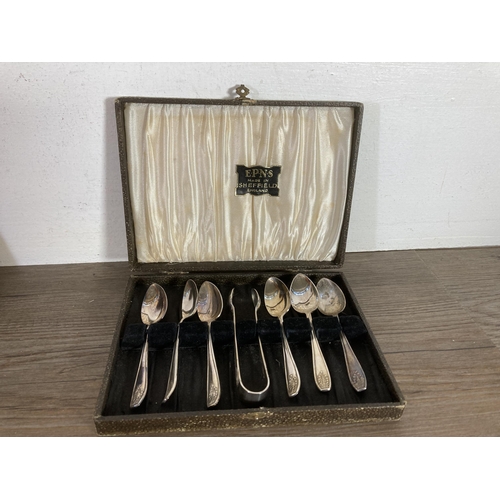 317 - A collection of metalware to include eight Mayell EP on Zinc napkin holders, Viners cutlery, cased s... 