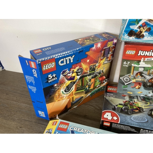 327 - Twelve boxed Lego sets to include Lego City, Batman, Spiderman etc.