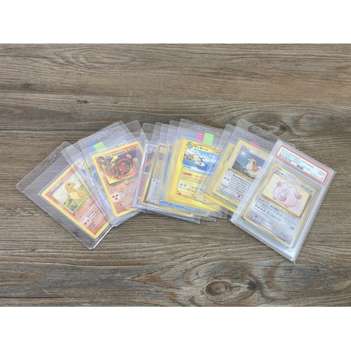 332 - A collection of Pokémon trading cards to include 2016 Japanese Expansion 20th Anniversary 1st Editio... 