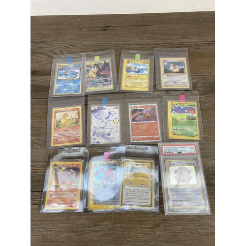 332 - A collection of Pokémon trading cards to include 2016 Japanese Expansion 20th Anniversary 1st Editio... 