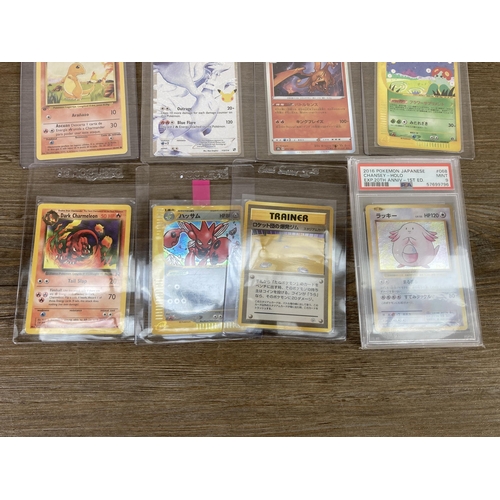 332 - A collection of Pokémon trading cards to include 2016 Japanese Expansion 20th Anniversary 1st Editio... 