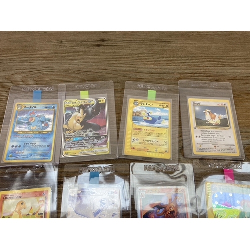 332 - A collection of Pokémon trading cards to include 2016 Japanese Expansion 20th Anniversary 1st Editio... 