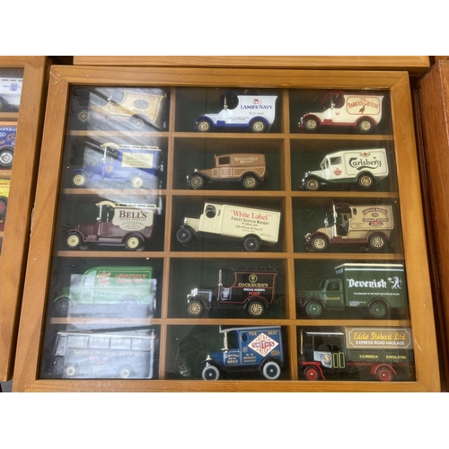 339 - Nine hardwood display cases containing a large collection of various diecast model vehicles