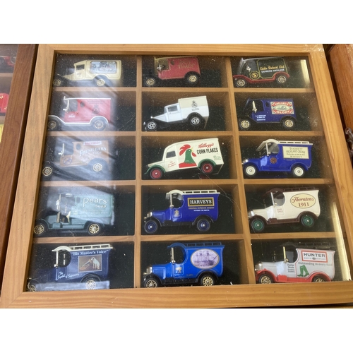 339 - Nine hardwood display cases containing a large collection of various diecast model vehicles