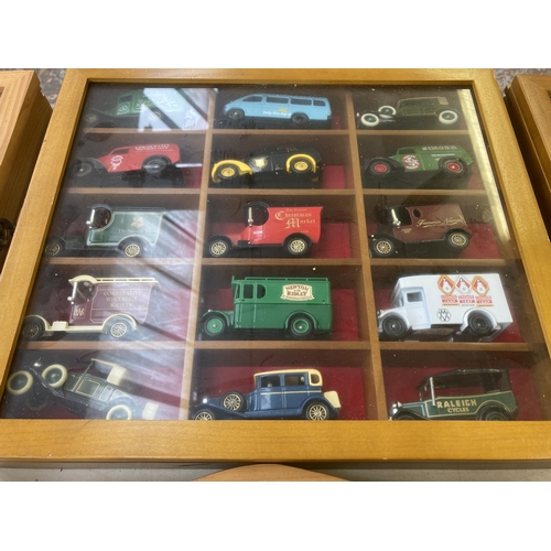 339 - Nine hardwood display cases containing a large collection of various diecast model vehicles