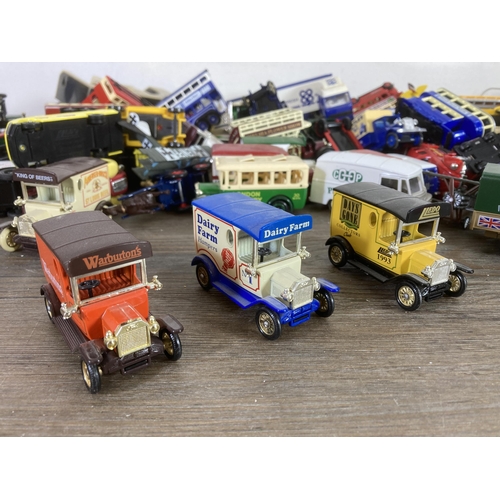 341 - A large collection of vintage diecast model vehicles to include Lledo Desperate Dan, Lledo Days Gone... 