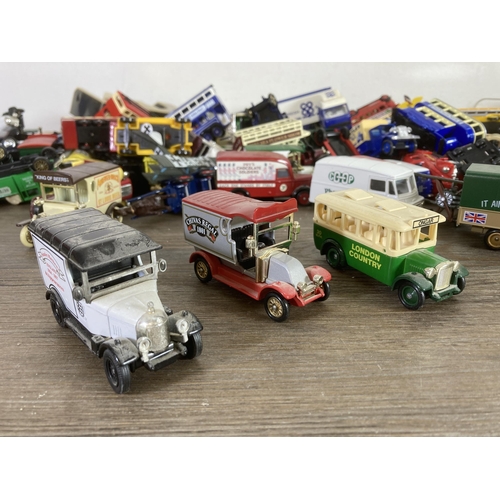 341 - A large collection of vintage diecast model vehicles to include Lledo Desperate Dan, Lledo Days Gone... 