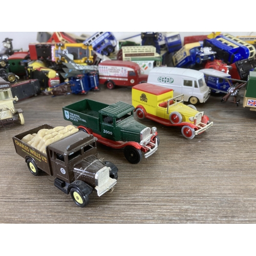 341 - A large collection of vintage diecast model vehicles to include Lledo Desperate Dan, Lledo Days Gone... 