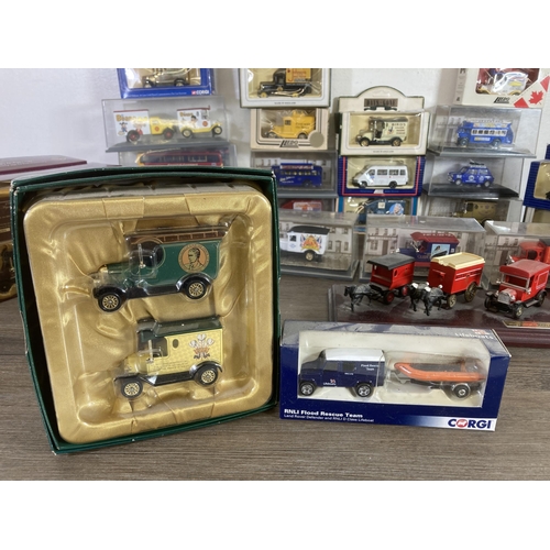 342 - A large collection of mainly boxed diecast model vehicles to include Corgi William and Kate Royal We... 