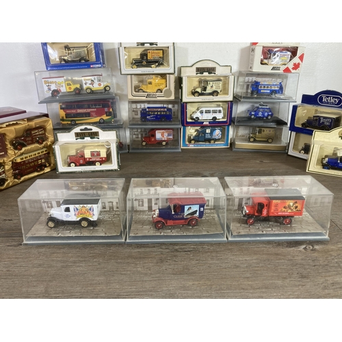 342 - A large collection of mainly boxed diecast model vehicles to include Corgi William and Kate Royal We... 