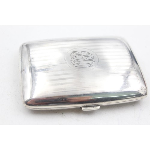 1231 - A George V hallmarked Birmingham silver cigarette case, dated 1919 - approx. gross weight 79 grams a... 