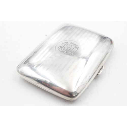 1231 - A George V hallmarked Birmingham silver cigarette case, dated 1919 - approx. gross weight 79 grams a... 