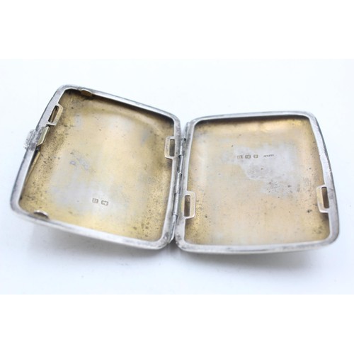 1231 - A George V hallmarked Birmingham silver cigarette case, dated 1919 - approx. gross weight 79 grams a... 