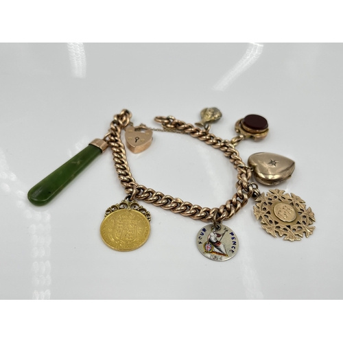 1119 - A late 19th/early 20th century 9ct gold bracelet with 9ct gold heart shaped padlock clasp and seven ... 