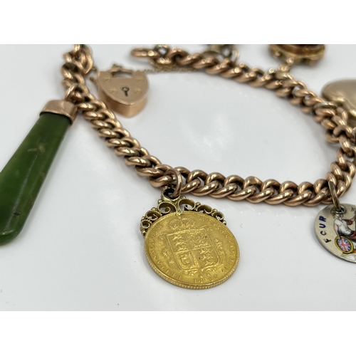 1119 - A late 19th/early 20th century 9ct gold bracelet with 9ct gold heart shaped padlock clasp and seven ... 